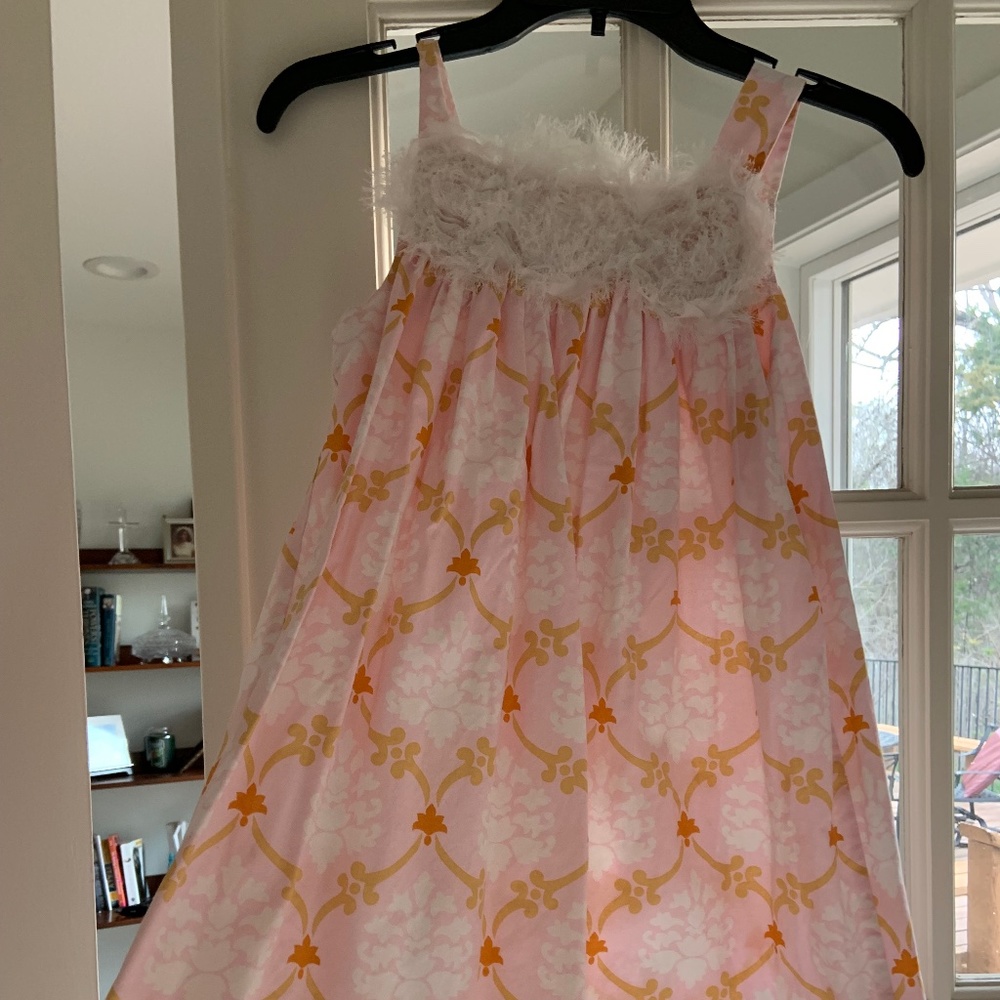 Pillowcase dress with white roses on bodice